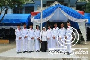 Sembilan Siswa MAN 1 Kendari Kibarkan Bendera di HAB